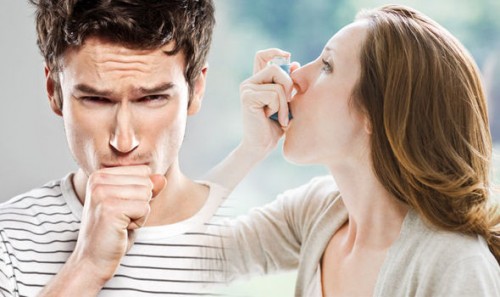 A man and women with asthma inhaler