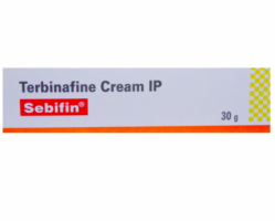 A tube on top of the box of generic terbinafine 1 % cream